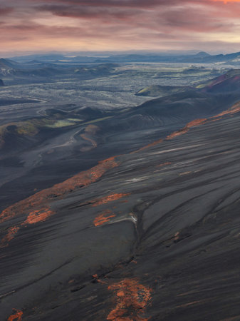 Aerial View of Volcanic Landscape with Orange Red Rocks in Icelandの写真素材