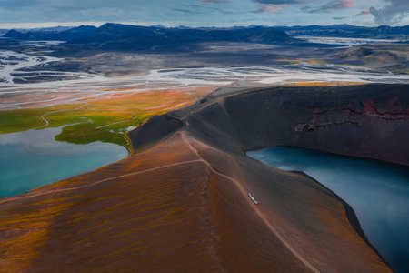 Aerial View of Volcanic Crater and Lake in Icelands Vibrant Terrainの写真素材