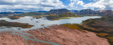 Aerial View of Icelandic Lake with Multicolored Hills and Riversの写真素材