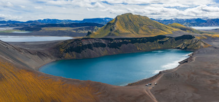 Aerial View of Volcanic Crater Lake and Moss Covered Hills in Icelandの写真素材