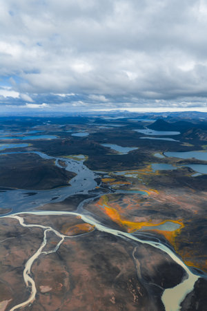 Aerial View of Braided Rivers and Volcanic Terrain in Icelandの写真素材