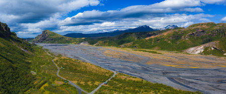 Aerial View of Braided River and Snow Capped Peaks in Iceland