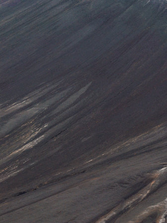 Close Up of Textured Volcanic Landscape with Sloping Ridges in Iceland
