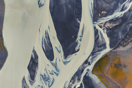 Aerial View of Braided River System Over Volcanic Sands in Iceland