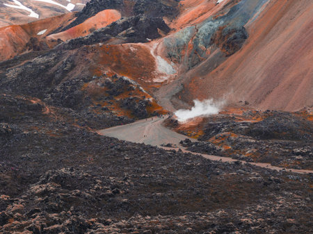 Geothermal Landscape with Rhyolite Hills and Steam Vent in Icelandの写真素材