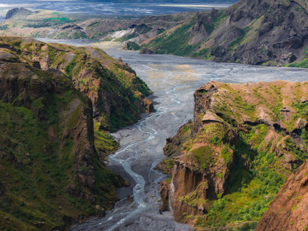 Mulagljufur Canyon with Glacial River and Distant Mountains in Icelandの写真素材