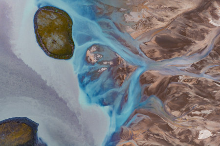Aerial View of Braided Glacial River and Moss Covered Islands in Iceland