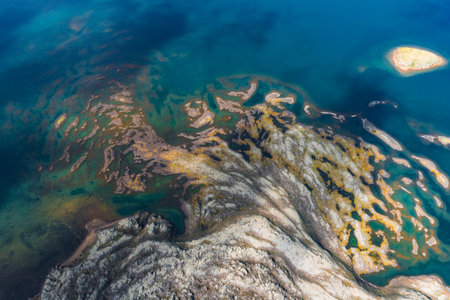 Aerial View of Vibrant Waters and Patterns in Icelands Landscape