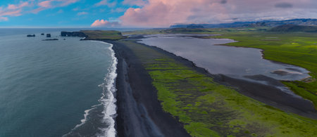 Aerial View of Icelands Black Sand Beach and Coastal Rock Formations