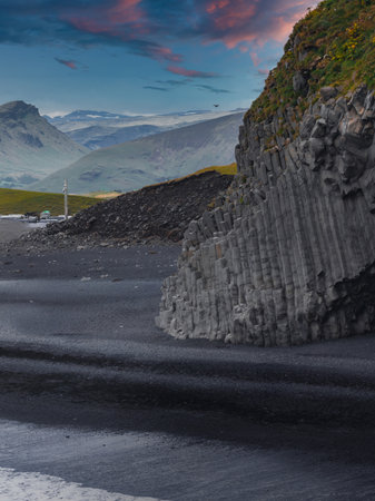 Basalt Columns at Reynisfjara Black Sand Beach During Sunset