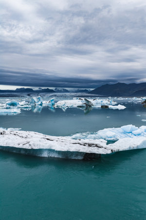 Serene View of Jokulsarlon Glacier Lagoon with Floating Icebergs