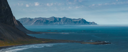 Aerial View of Stokknes Peninsula with Black Sand Beach in Iceland