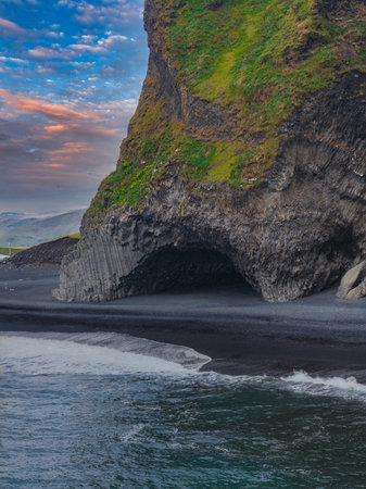 Basalt Rock Formation and Black Sand Beach at Reynisfjara, Icelandの写真素材