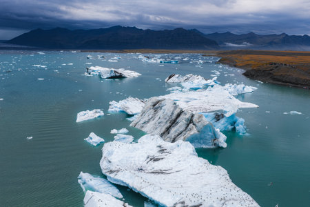 Aerial View of Icebergs in Turquoise Waters at Icelands Glacial Lagoon