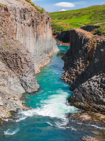 Studlagil Canyon with Basalt Columns and Turquoise River in Iceland