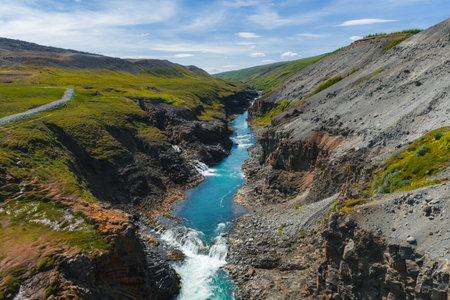 Studlagil Canyon with Turquoise River and Basalt Formations in Iceland