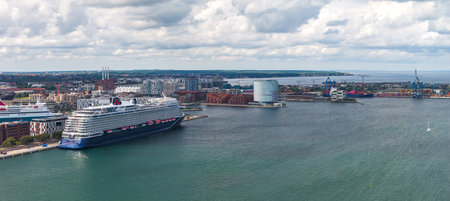 Aerial View of Copenhagen Harbor with Cruise Ships and Modern Buildings