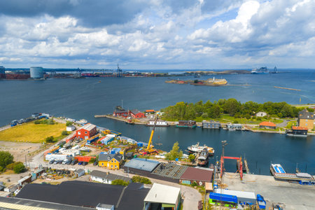 Aerial View of Copenhagen Waterfront with Harbor and Industrial Areaの写真素材