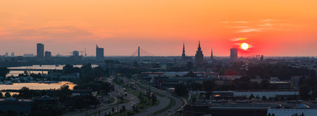 Sunset Over Riga with Riga TV Tower and Vansu Bridgeの写真素材