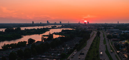 Sunset Over Riga with Daugava River, and Old Town Spiresの写真素材