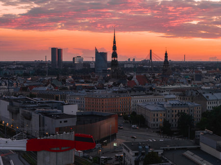 Sunset Over Riga Old Town with St. Peters Church and Vansu Bridgeの写真素材