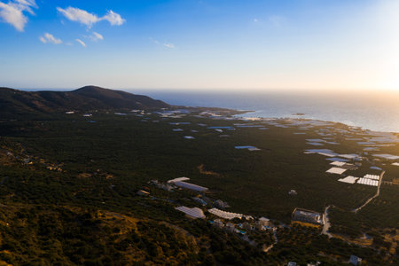 Aerial View of Coastal Landscape on Crete Island at Sunsetの写真素材