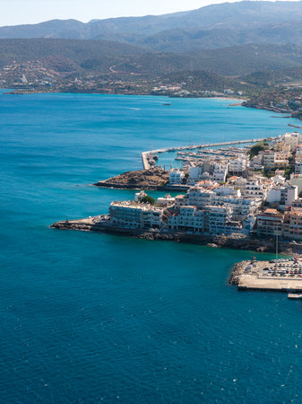 Aerial View of Agios Nikolaos with Marina and Turquoise Watersの写真素材