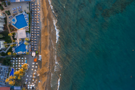 Aerial View of Stalida Town with Beach and Resort Pools in Creteの写真素材
