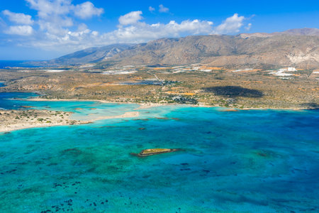 Aerial View of Elafonisi Beach with Lagoon and Rocky Islet in Creteの写真素材