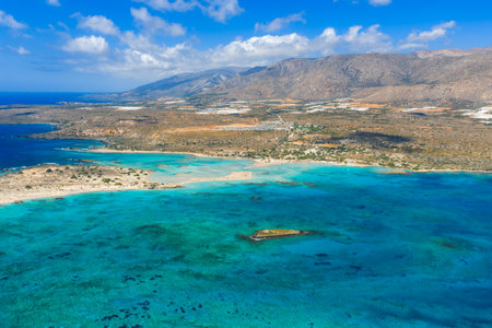 Aerial View of Elafonisi Beach with Turquoise Waters and Rocky Isletの写真素材