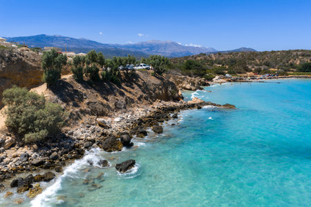 Aerial View of Voulisma Beach with Turquoise Waters and Cliffsの写真素材