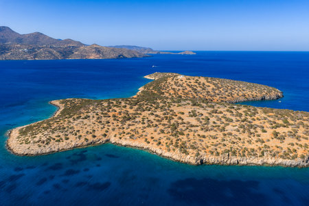 Aerial View of Rugged Island and Mediterranean Waters Near Creteの写真素材