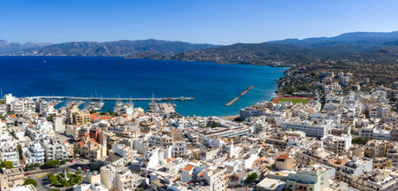 Aerial View of Agios Nikolaos with Marina and Coastal Landscapeの写真素材