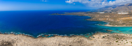 Aerial View of Elafonisi Beach with Turquoise Waters and Mountains