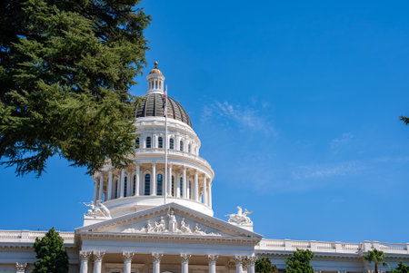 California State Capitol Building with Dome and Flag in Sacramentoの写真素材