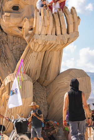 Large Wooden Human Sculpture at Burning Man Festival in Nevada Desertの写真素材