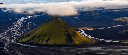 Aerial View of Moss Covered Volcanic Cone and Glacial Rivers in Iceland