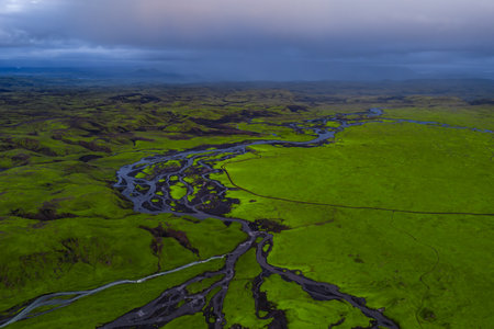 Aerial View of Icelands Green Landscape with Rivers and Hillsの写真素材