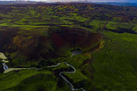 Aerial View of Volcanic Crater with Lake and River in Icelandの写真素材