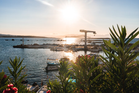 Sunset Scene with Boats on Crete Island, Greeceの写真素材