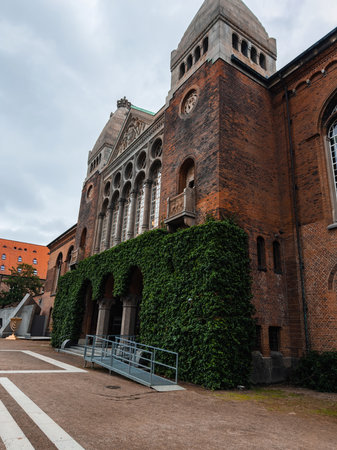 Historic Brick Building with Tower in Copenhagen, Denmarkの写真素材