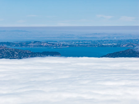 Aerial View of San Francisco Bay with Fog and Cityscape in Background