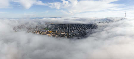 Aerial View of San Francisco with Fog and Sutro Tower Visible