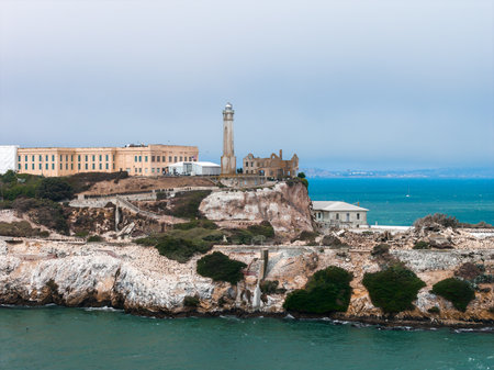 Aerial View of Alcatraz Island with Lighthouse and Prison Complexの写真素材