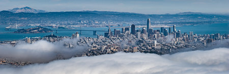 Aerial View of San Francisco Skyline with Bay Bridge and Clouds