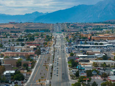 Aerial View of Carson City with Central Road and Mountain Backdropの写真素材