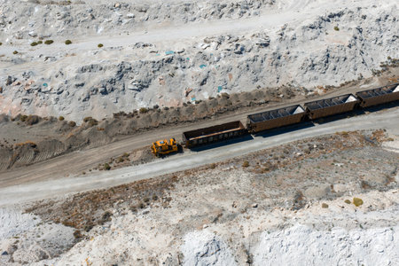 Aerial View of Salt Mining Site with Yellow Vehicle in Nevada