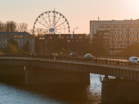 Aerial View of Riga with Bridge, Ferris Wheel, and Urban Landscapeの写真素材