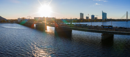 Aerial View of Riga with Daugava River, Bridge, and City Skyline