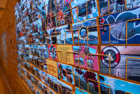 Colorful Display Wall of Postcards Highlighting Destinations
